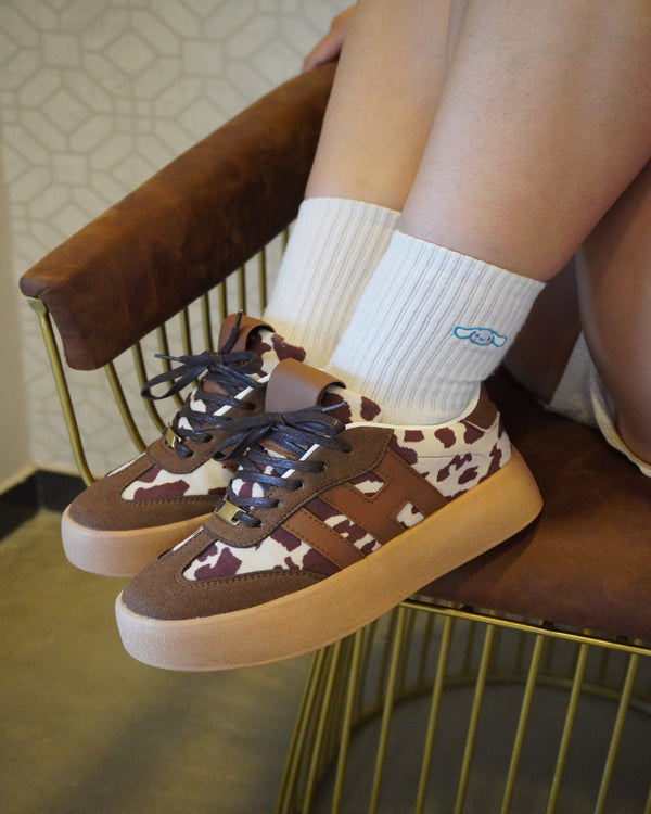 Tenis de lona bondeada y carnaza con plataforma cow print para mujer